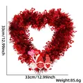 Red heart-shaped tinsel wreath with three Valentine's gnomes, size 33cm by 33cm - Gnome XOXO (No Light)
