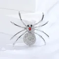 Retro spider brooch for men with silver finish and sparkling red center stone detail - White