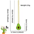 Green felt avocado pendant necklace with yellow plastic beads for Cinco de Mayo party decor - Avocado