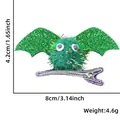 Detailed size chart showing green glitter bat hair clip dimensions 8cm by 4.2cm and weight - Green