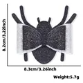 Fermaglio Halloween ragno nero glitter con fiocco, accessorio per feste da 8,3x8,2cm - Fiocco di Ragno