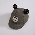 Detail van babyhonkbalpet met panda-oren en bruin houndstooth patroon voor peuters - 50-52CM / Bruine Houndstooth