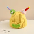 Close-up of funny cartoon monster hat with colorful antennae and knit texture details - Baby Approx 2-6 Years / Yellow