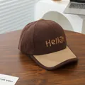 Λεπτομέρεια από κοτλέ ύφασμα και κέντημα Hello σε παιδικό χειμερινό καπέλο μπέιζμπολ - Παιδικό Μέγεθος / Patchwork Καφέ & Χακί