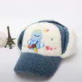 Kids navy blue and white plush winter earflap hat with cute cartoon dinosaur patch - Kids approx 3-10 years / Blue