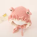 Detail of pink knitted baby hat with cute 3D ears and wavy frill edges for winter warmth - Heart Style / Pink