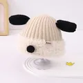 Detail of baby winter knit hat featuring plush fleece lining and cute long puppy ears - 48-50cm (Fits 2-4 Years) / Off White
