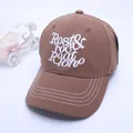 Close-up of brown baseball cap with 3D letter embroidery and white contrast stitching - 50-54cm / Grey Coffee