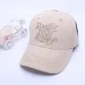 Close-up of beige cotton baseball cap with Rest & Recreation embroidery and a side tag - 50-54cm / Khaki