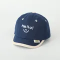 Donkerblauwe baby honkbalpet met wit Hello borduurwerk en een vrolijk gezicht - Hello Smile Stijl / Blauw