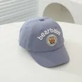 Detailed view of 3D bear embroidery and bearbaby text on a blue kids baseball cap - Infant One Size / Gray