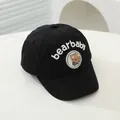 Detail of baby baseball cap featuring bearbaby embroidery and 3D plush bear patch - Infant One Size / Black