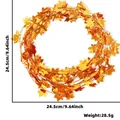Close-up of 7.5m orange maple leaf garland with metallic finish for Thanksgiving decor - Diameter 24.5cm / Gold (Textured)