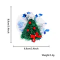 Christmas tree pet hair clip with green tinsel, red bows, and white tulle detail - Tinsel Christmas Tree Style B