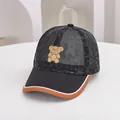 Detail of breathable mesh kids baseball cap featuring cute teddy bear embroidery - Adjustable Kids Size / Black