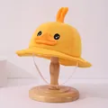 Yellow baby knitted bucket hat featuring a cute cartoon duck design with windproof strap - Toddler Size / Yellow