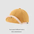 Berretto neonato in velluto a coste giallo con tesa morbida e bottone in metallo - Neonato (46-48cm) / Giallo