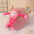 Detail of pink kids baseball cap with retractable robot toy and golden embroidered letter Z - Pink Robot Style