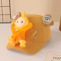 Close-up of yellow corduroy kids cap with cartoon robot toy and letter Z embroidery - Yellow Robot Style