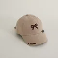 Kids khaki cotton baseball cap with embroidered brown bow and side text detail - 50-52CM / Deep Beige
