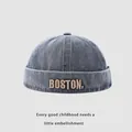 Close-up of Boston embroidery on a dark blue denim docker cap for children - 48-50cm / Dark Blue BOSTON