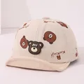 Casquette bébé en velours côtelé beige avec motifs d'ours et bordure souple - Beige (Modèle 1)