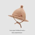 Camel corduroy baby bucket hat with pompom and adjustable chin strap in soft brown hue - Toddler (48-50CM) / Khaki