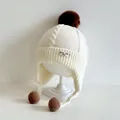 White knit baby hat with earflaps and dark brown pom poms for winter warmth - Baby 48-50cm (Suggest 2-4 Years) / White