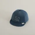 Navy blue baby baseball cap with waffle texture and Lucky bear embroidery - Blue