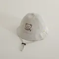 Beige baby bucket hat with Lucky bear embroidery and adjustable windproof strap - 48-50cm / Beige