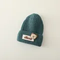 Gorro de punto grueso para bebé en azul cerceta con parche de oso de peluche suave - Talla única / Verde Hierba