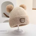 Winter knit baby hat with bear patch and double faux fur pom-poms in beige and oatmeal - Rubber Bear Badge Style (Style 3) / Beige