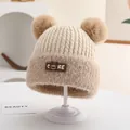 Beige winter knit baby hat with dual pom-poms and fleece brim featuring a bear label - CORE Silicone Tag Style (Style 4) / Beige