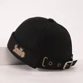 Detail of black cotton docker cap with Smile embroidery and adjustable metal buckle - Baby 2-6 Years 50-52CM / Black
