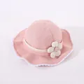 Detailed view of baby girl pink sun hat with white lace trim and 3D fabric flower decor - Toddler One Size / Pink