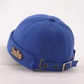 Detail of royal blue kids docker hat featuring a smile patch and adjustable metal buckle - Baby 2-6 Years 50-52CM / Sapphire Blue