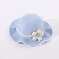 Close-up of light blue baby sun hat featuring white lace trim and 3D floral detail - Toddler One Size / Blue