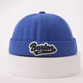 Close-up of royal blue cotton brimless cap with Barton embroidered patch and folded edge - One Size / Sapphire Blue