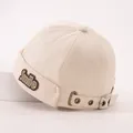 Detail of adjustable silver buckle and Smile label on cream canvas docker hat - Baby 2-6 Years 50-52CM / Beige