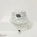 Detail of baby sun hat with dinosaur patterns and LOVE YOU patch plus adjustable chin strap - Toddler 1-4 Years 47-50CM / Black