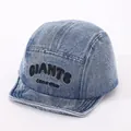 Close-up of black 3D embroidery GIANTS logo on premium light blue denim 5-panel cap - Baby 6-36 Months 46-48CM / Medium Denim