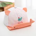 Close-up of baby mesh baseball cap with whale embroidery and orange striped ears - Orange/Fish Stripe