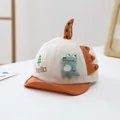 Detail of baby dinosaur baseball cap featuring 3D plush dinosaur and hello embroidery - 0-36 Months (46-48CM) / Orange