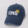Detail of white KING embroidery and yellow crown on navy blue cotton baseball cap - Kids 48-53CM / Navy Blue