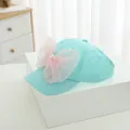 Detalle de visera para niña verde menta con gran lazo rosa y adornos de perlas finas - Talla Infantil / Azul Cielo