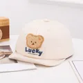 Creamy white baby baseball cap with soft fold brim and plush brown bear embroidery - Lucky Bear Beige
