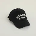 Black kids baseball cap with white LIVELY AND ACTIVE embroidery on front - Kids One Size / Black