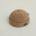 Baby muts van corduroy in camelbruin met een schattig goudkleurig berenaccent - Baby 50-52CM / Khaki