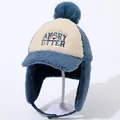 Detail of winter trapper hat featuring polar fleece texture and Angry Otter embroidery - Blue