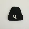 Black knitted baby winter hat with willow pattern and white H embroidery and smiley face - Kids 2-7 Years / Black